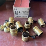 Bryant Medium Base Brass Shell Key Lamp Holder Lot. Fixed Price $59.00.