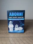 2 Pcs Aborni 3 Prong Light Socket To Plug Adapter, Outlet, White. Fixed Price $6.00.