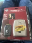Ge Indoor Lighted Entry Kit-outlet Adapter W/ Remote Control-new-sealed (c7b2). Fixed Price $22.00.