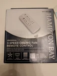 Hampton Bay 99130 White Universal 3-speed Ceiling Fan Remote Control W/ Dimmer. Fixed Price $27.00.